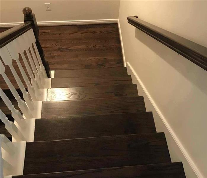 finished hardwood floor on stairwell